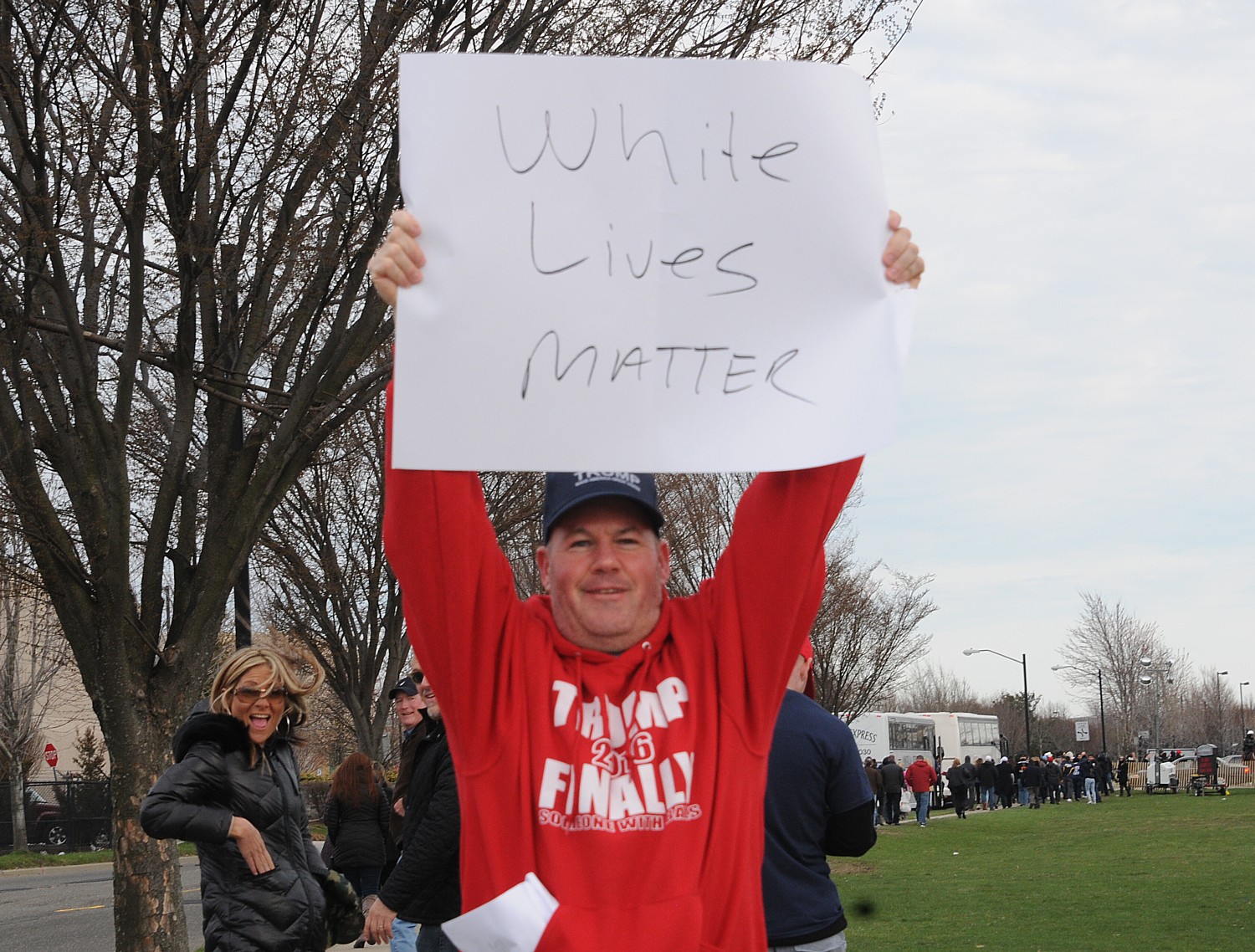 Supporter at Donald Trump rally, Bethpage, Long Island, NY, holds sign, "White Lives Matter" © 2016 Karen Rubin/news-photos-features.com