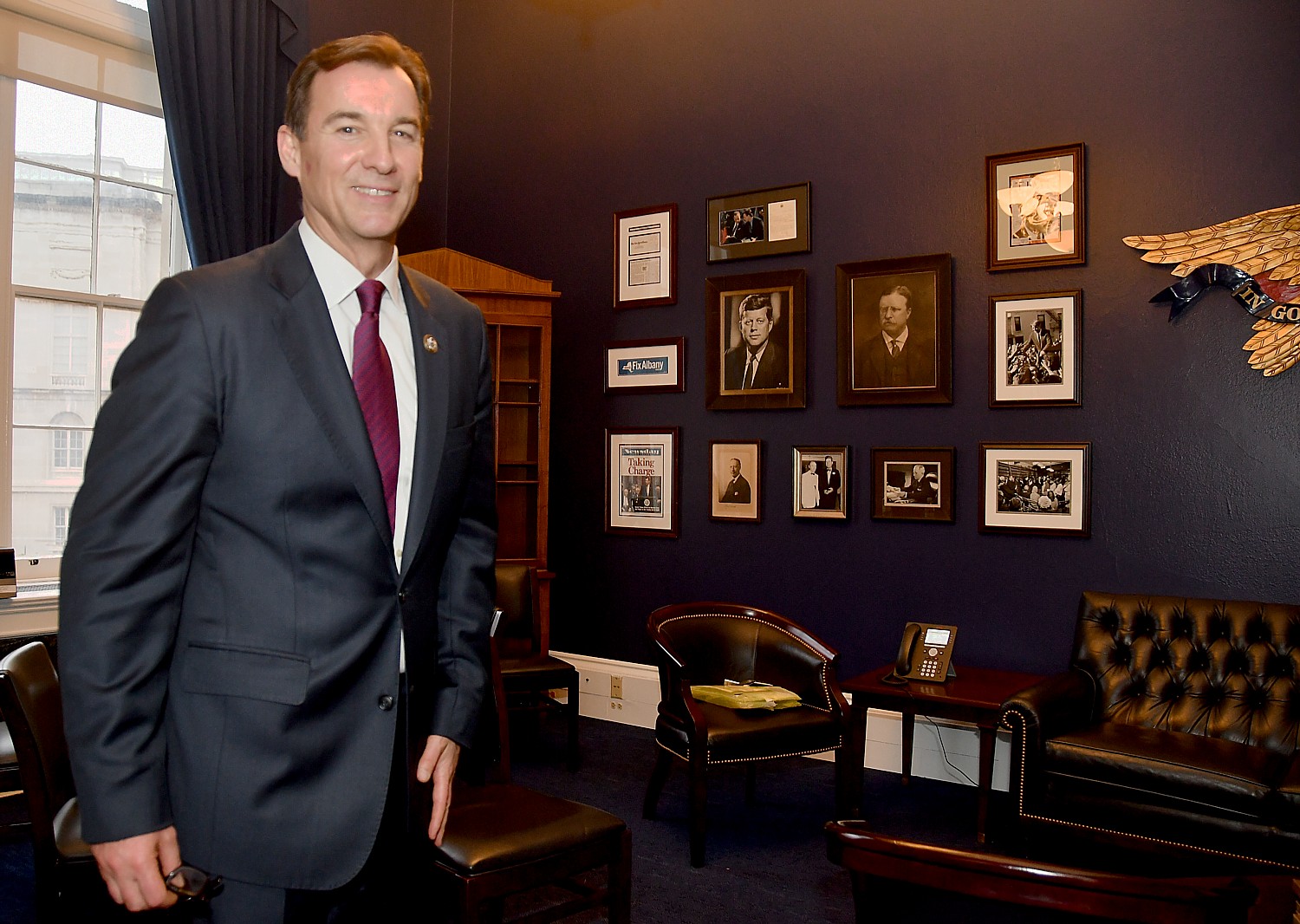 Congressman Tom Suozzi and his “wall of heroes” in his new office  © 2017 Karen Rubin/news-photos-features.com