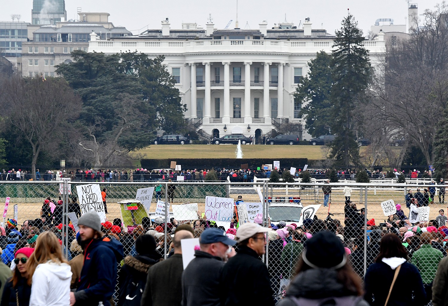 Women’s March Protesters kept at a distance from the White House on Saturday, Jan. 21, 2017. Many called for protecting the environment and climate. Donald Trump is dismissive, telling auto manufacturers that environmental regulations “are out of control.” © 2017 Karen Rubin/news-photos-features.com